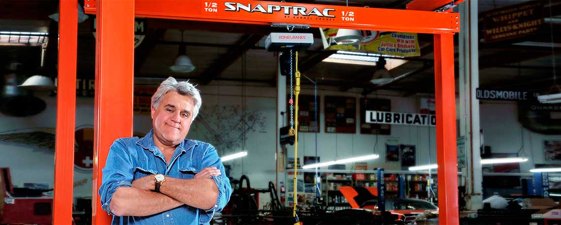 Photograph of Jay Leno posing with his Snaptrac