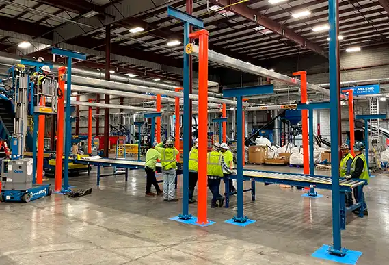 workers using an istrut system in a production plant