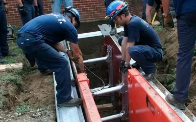 Active vs. Passive Shoring: Why Hydraulic Jacks Prevent Trench Movement
